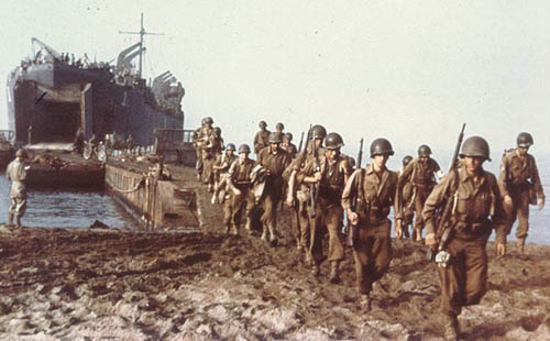 U.S. troops and equipment land at Salerno, Italy in September 1943